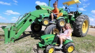 'Playing on the farm with kids John Deere tractors | Tractors for kids'