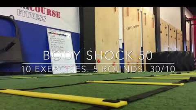 'WOD 21: Body Shock 50. 10 Exercises. 5 Rounds. 30/10'