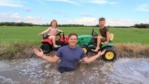 'Playing in the mud and watering hay with kids tractors | Tractors for kids'