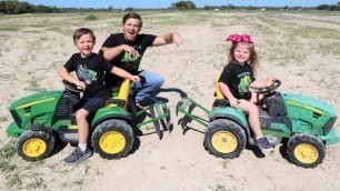 'Using kids tractors to plow up field | Tractors for kids working on the farm'