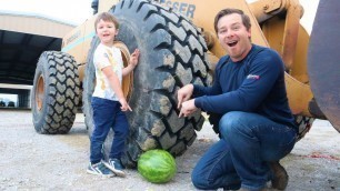 'Crushing things on the farm using real tractors | Tractors for kids'