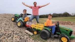 'Playing with tractors in the rocks and mud | Tractors for kids'