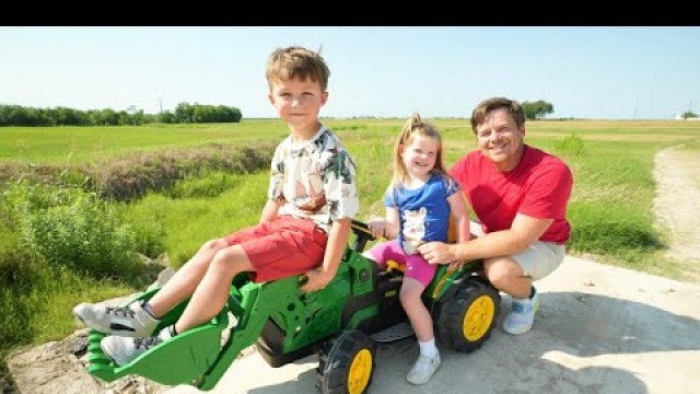 'Using kids tractors on the farm to clean hay field | Tractors for kids'