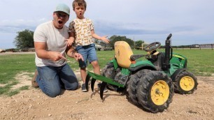 'Using kids tractor to plow dirt | Tractors for kids working on the farm'