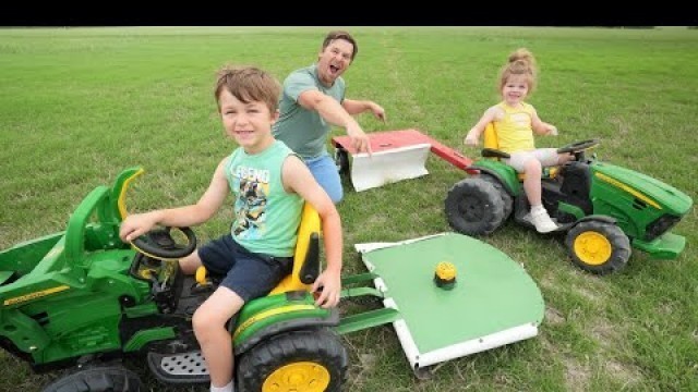 'Using kids tractors to mow hay on the farm | Tractors for kids'