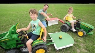'Using kids tractors to mow hay on the farm | Tractors for kids'