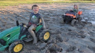 'Playing in the mud with tractors | Both kids get stuck | Tractors for kids'