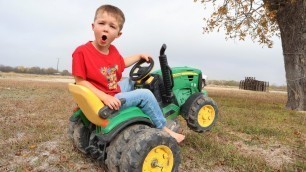 'Playing on the farm with real tractors and toy tractors | Tractors for kids'