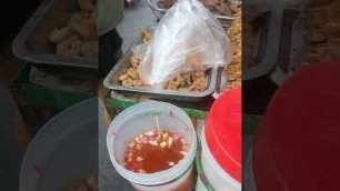 'fried crispy squid and fried betamax|Street foods'