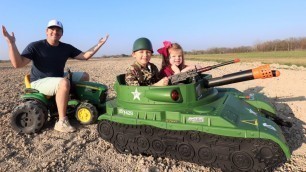 'Playing in the dirt with our kids tractors and tank | Tractors for kids'