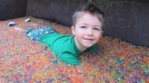 'Playing with tractors full of Orbeez | Tractors for kids on the farm'