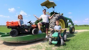 'Working on tractors and playing in the water | Tractors for kids on the farm'