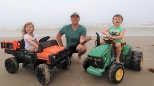'Using toy tractors to find hidden treasure on the beach | Tractors for kids'