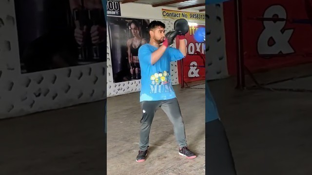 'Boxing punching combination in Punching pad #boxing #shorts #fitness #motivationalvideo'