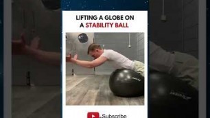 'Lifting a Globe on a Stability Ball Exercise #shorts'
