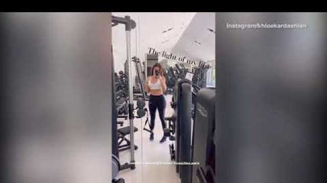 'Khloe Kardashian stuns as she flashes her abs during workout'