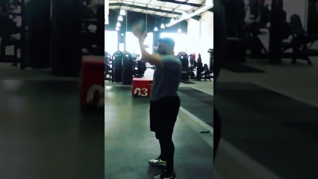 'Overhead squat slams with medicine ball pure gym exchange quay'