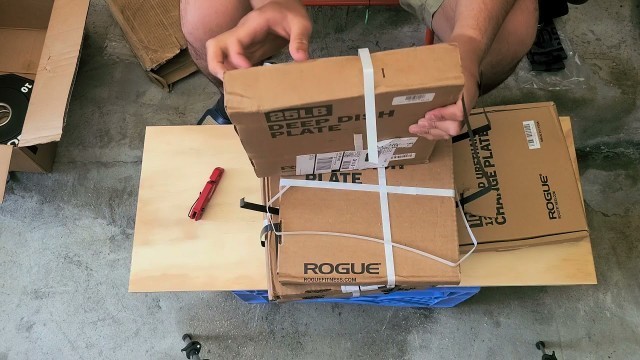 'Rogue fitness weight plates and gear unboxing'