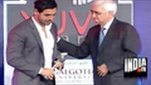 'John Abraham gives fitness tips to Salman Khursheed'