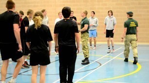 'The Royal Marines doing a fitness warm up with our SWC students!'